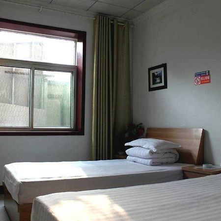 Jinan Quanyou Hostel Extérieur photo