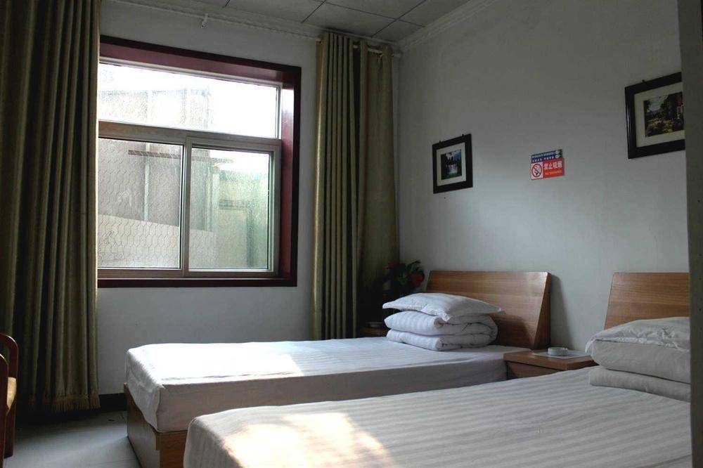 Jinan Quanyou Hostel Extérieur photo